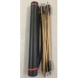 A set of 12 handmade wooden 26" steel-tipped arrows with black fletchings.