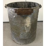 A vintage galvanised closet bucket with carry handle, pouring handle and bracket for hinged lid.