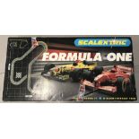 A boxed Scalextric "Formula One" racing set, complete and with instructions.