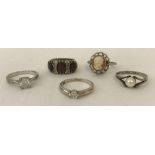 5 ladies silver dress rings.