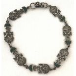 An Aztec style bracelet set with pieces of malachite. Marked to back of clasp 925.