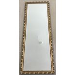 A modern rectangular wall hanging gilt framed mirror.