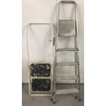 A Beldray aluminium folding step ladder, together with one other.