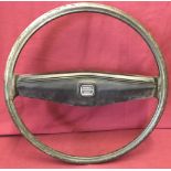 A vintage Vauxhall 'Energy absorbing' steering wheel.