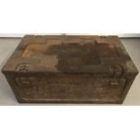 A WWII metal ammunition box marked war department 1941.