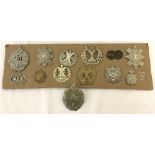 A collection of 13 original WWII era Scottish Regiments 2 lug cap badges.