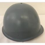 A Polish-made Wz75 steel helmet c.1988. Complete with helmet net .