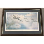 A framed and glazed limited edition print "Stalag Bound" of flying Spitfires.