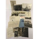 A collection of assorted military related ephemera to include photos, booklets and certificate.