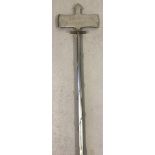 A modern handmade metal long handled double axe weapon.