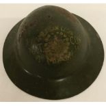 A USA WWII era miniature American Legion helmet.