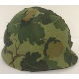 Vietnam War style US M1 helmet with reversable Mitch cover and period liner.