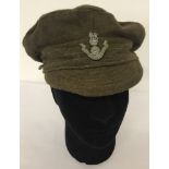 WW1 Style British "Tommy" Cap. Marked 1915, with North Lancashire Regiment cap badge.