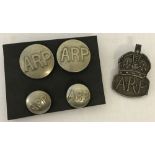 A silver ARP lapel badge together with 4 ARP buttons.