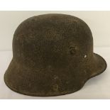 A German WWI M-16 Stahlhelm helmet.