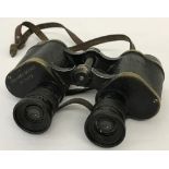 A pair of Military issue Bino Prism No. 2 MKII binoculars.