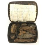 A tin of shrapnel. Reputedly dropped on Whitehall London October 1941.