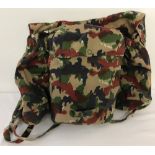 A lightweight canvas rucksack in German Fecktarn pattern camouflage.