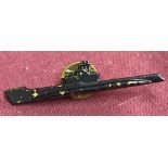 WW2 style US Submariners lapel pin painted black.