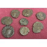 8 Roman Coins that were found in Sussex, England.