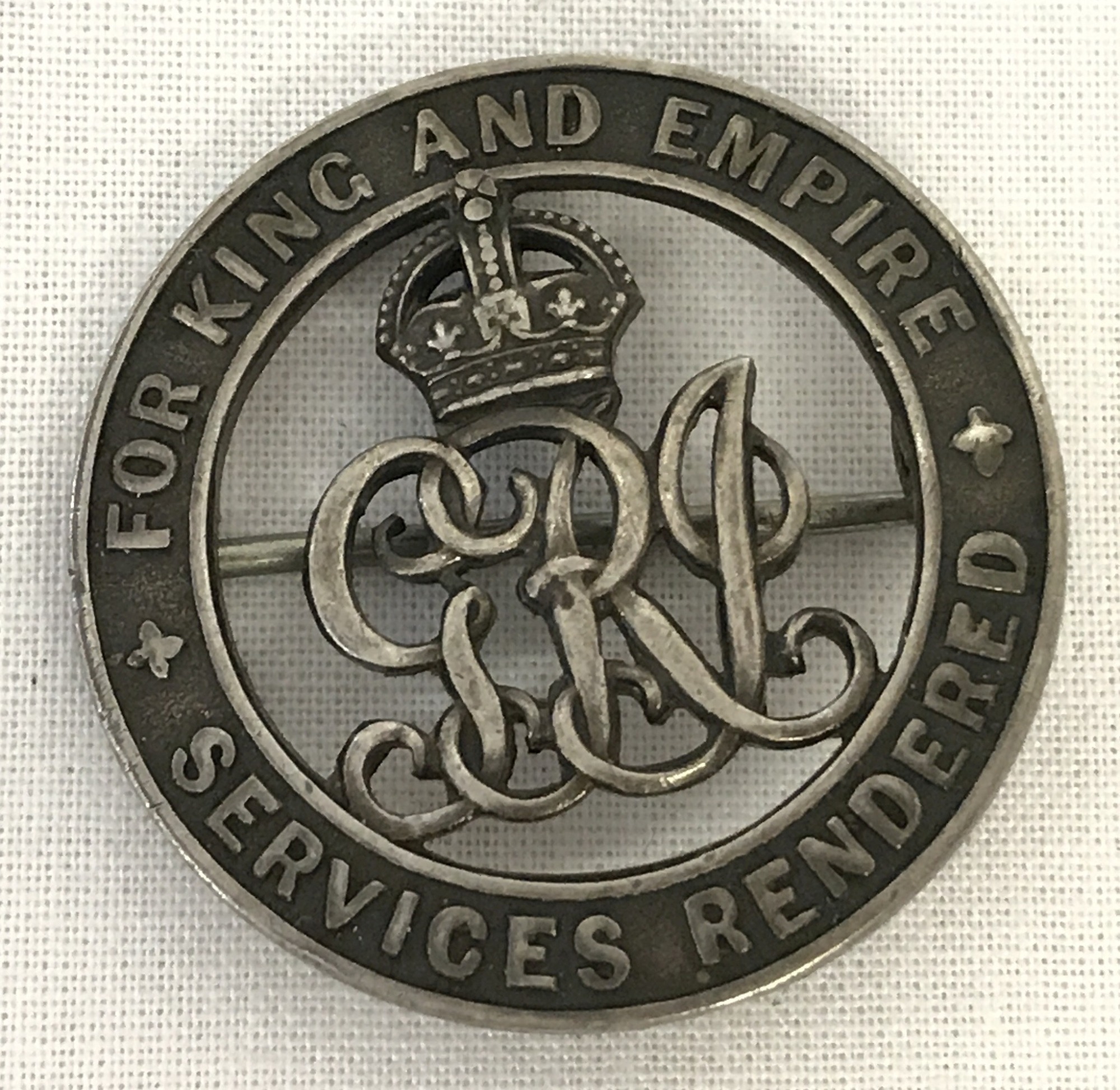 WWI British silver "For King & Empire Services Rendered" wound pin back badge.