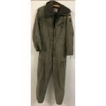 A khaki green German army flight suit complete with full length detachable fleece lining.