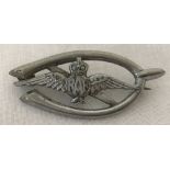 A Vintage white metal R.A.F Sweethearts brooch. Featuring wings within a wish bone.