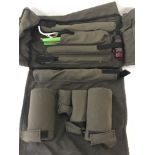 British Army 81mm mortar cleaning kit in a green canvas bag with black straps.