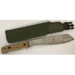 A War Dept. stamped, wooden handled machete in canvas sheath, dated 1993.