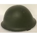 Post War style British Turtle helmet with no Liner. Chin strap missing.