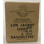 WW2 style boxed British R.A.F life jacket light dated 1944.