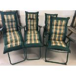 4 folding garden chairs with quilted back and seat covers in floral design.
