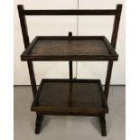 A vintage dark oak 2 tier folding tea tray/cake stand.