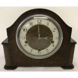 A vintage dark wood cased, Smiths mantle clock with Westminster chime.