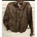 A vintage "Stylemaster" brown leather blouson jacket with harlequin design.