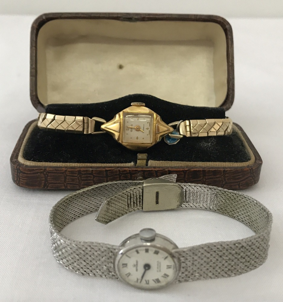 A vintage ladies gold plated Oris watch with expanding strap together with one other.