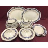 A large quantity of Corona dinnerware in a floral pattern.