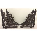 A set of 4 cast iron decorative wall brackets.