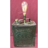 A vintage Esso 2 gallon petrol can converted into an electrical lamp.
