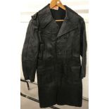 A vintage "Harrison & Peters Ltd" full length vintage men's black leather trench coat.
