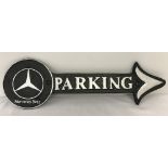 A wall hanging cast iron Mercedes Benz Parking arrow.