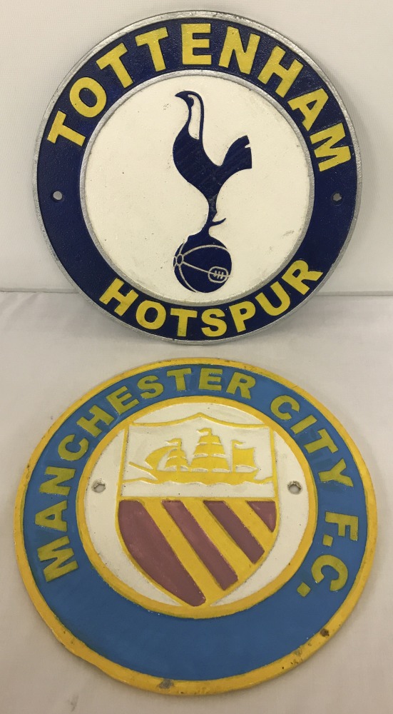 2 painted cast iron circular Football Club wall plaques.