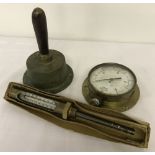 3 vintage brass items. An unusual brass bell together with 2 gauges.