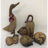 5 large carved wood animal ornaments.