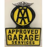 An aluminium AA "Approved Garage Services" wall sign.