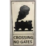 A large painted cast iron, wall hanging, Railway crossing sign.