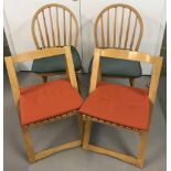 4 vintage light wood chairs. 2 wheel back kitchen chairs together with 2 folding chairs.