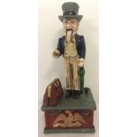 A painted cast iron mechanical "Uncle Sam" money box, with push button action.