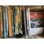 A box of assorted military related books & magazines, mostly large hard back books.