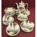 A set of "Trade Winds" vintage tea ware in a floral pattern.